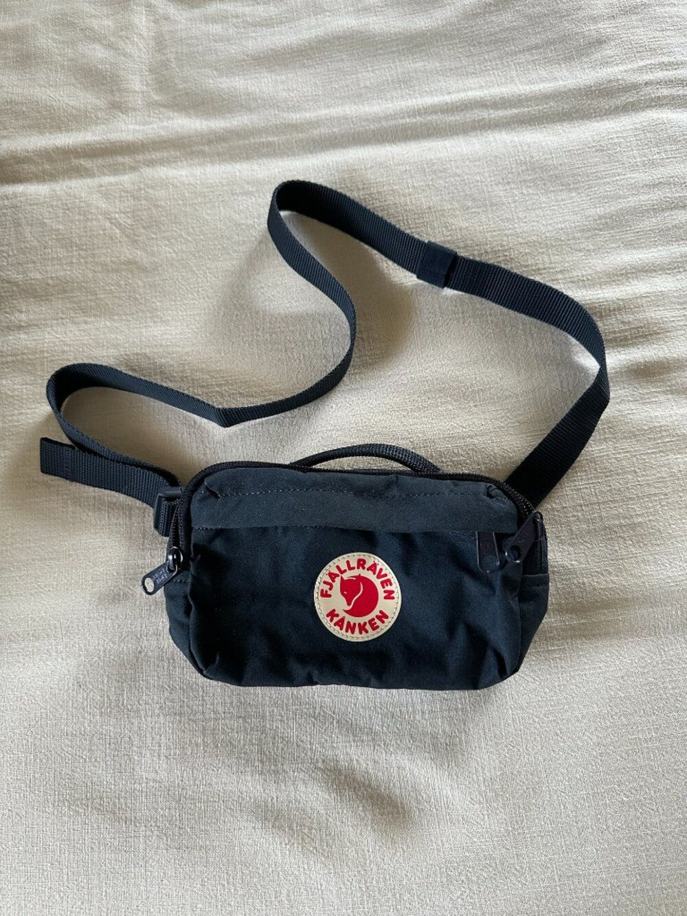 Navy Blue Fjallraven Kanken Hip Bag with zipper closure
